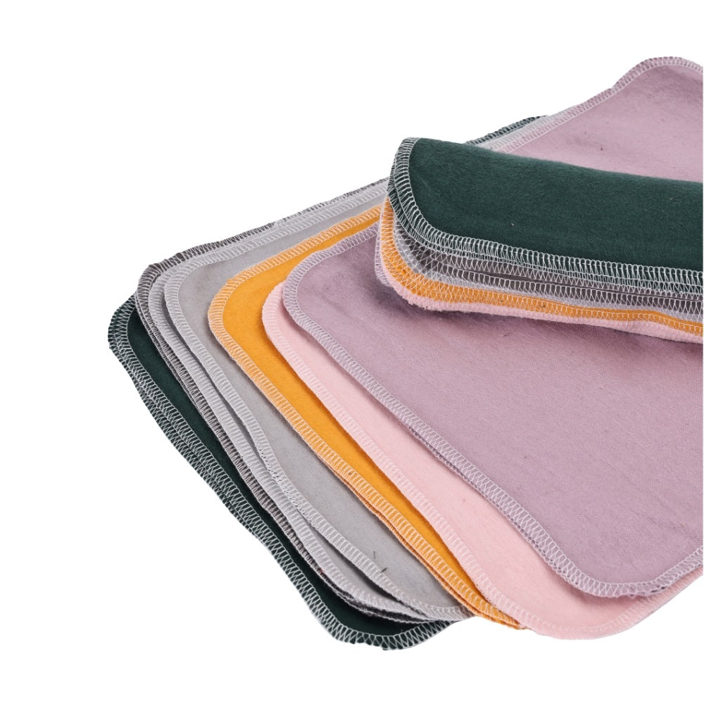Folded cotton flannel cloth napkins nature inspired color palette sustainable living soft texture