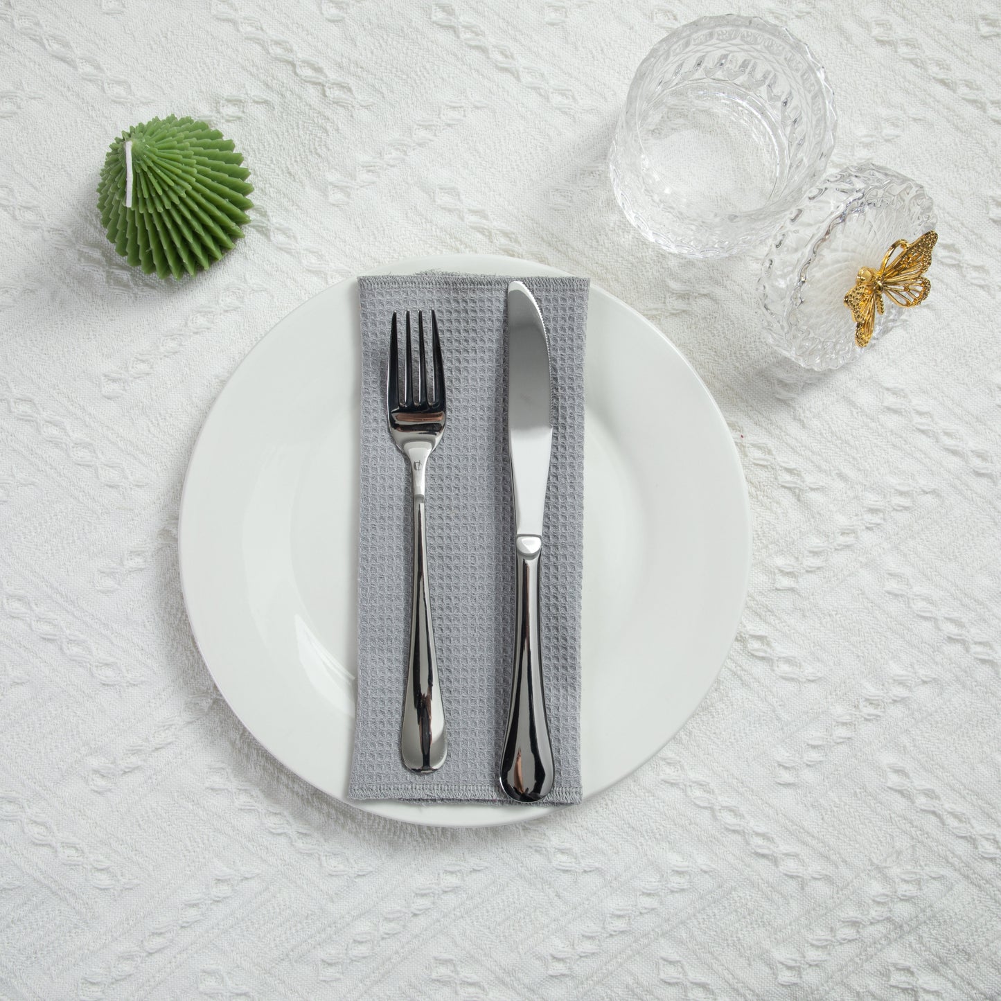 Modern kitchen table setting with cool grey waffle napkin