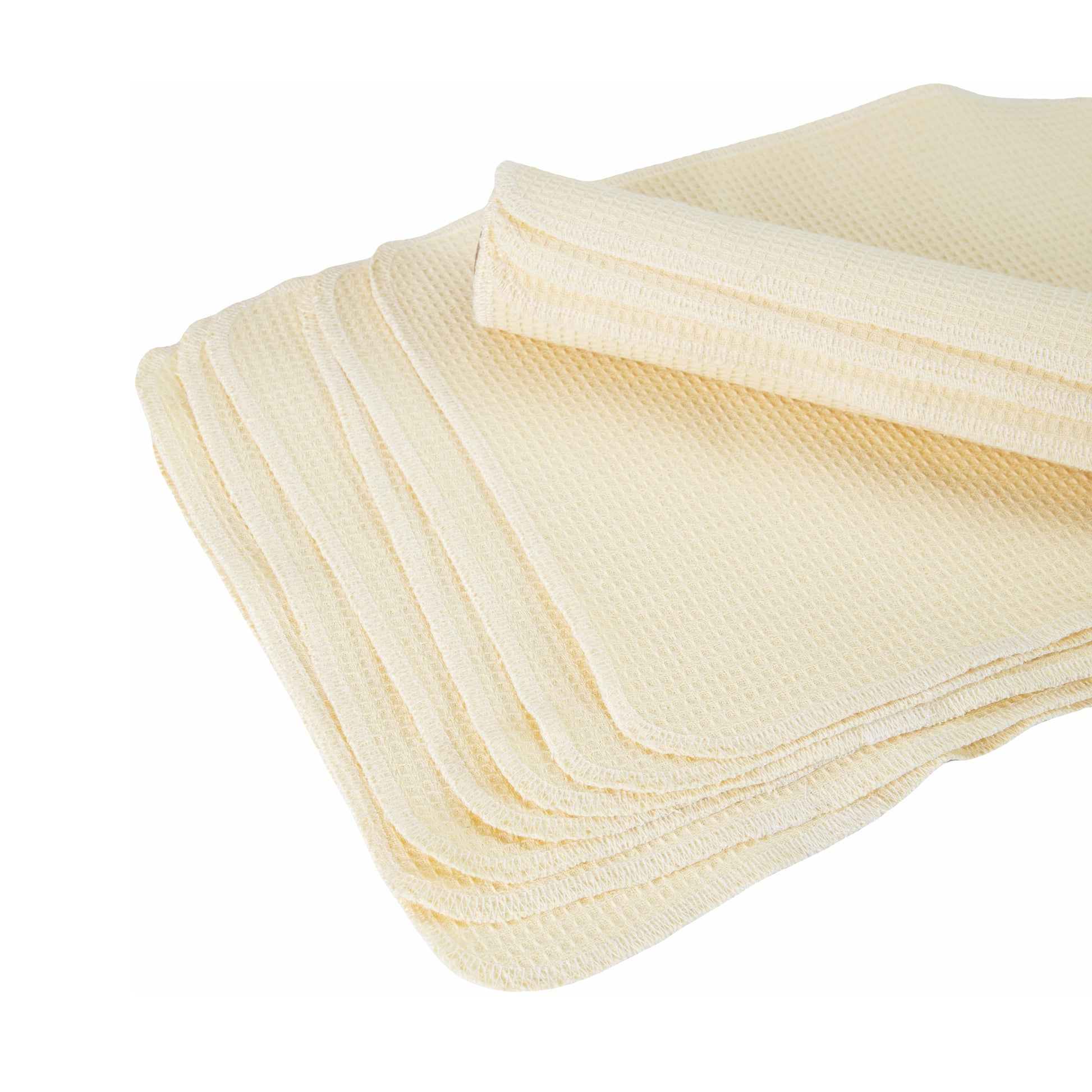 Folded stack of light beige cotton wipes earth tone decor