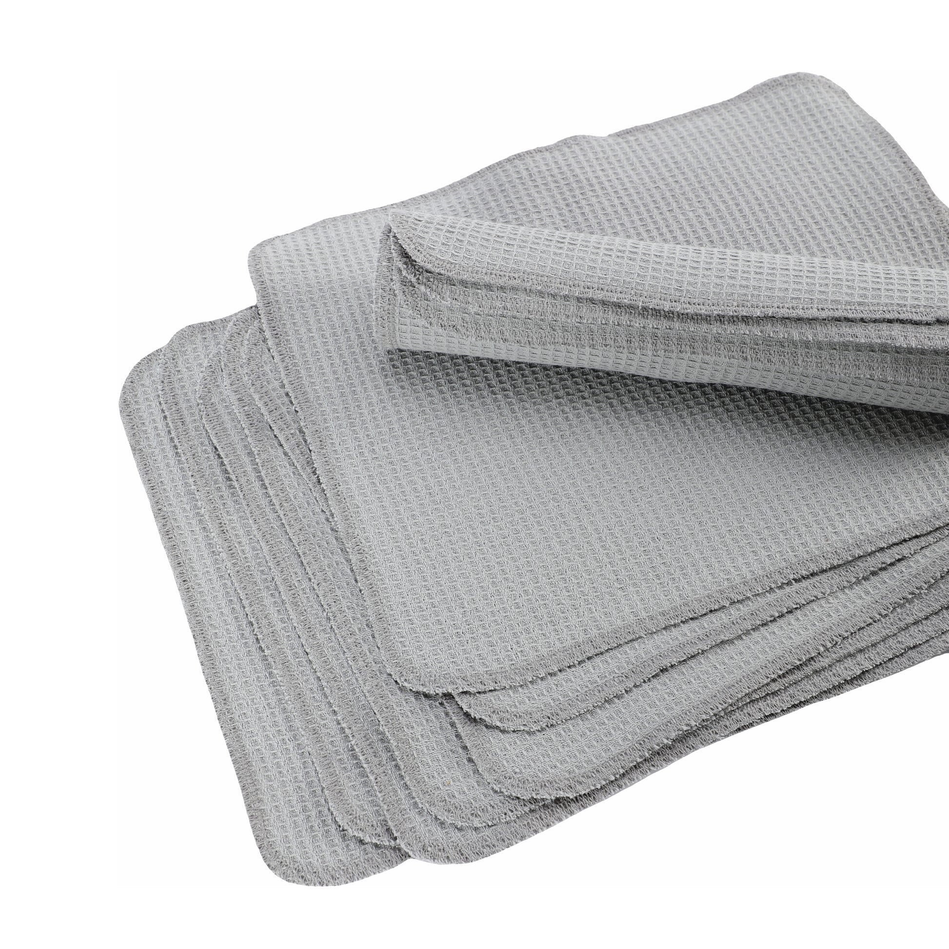 Stacked light grey waffle cleaning cloths detail view