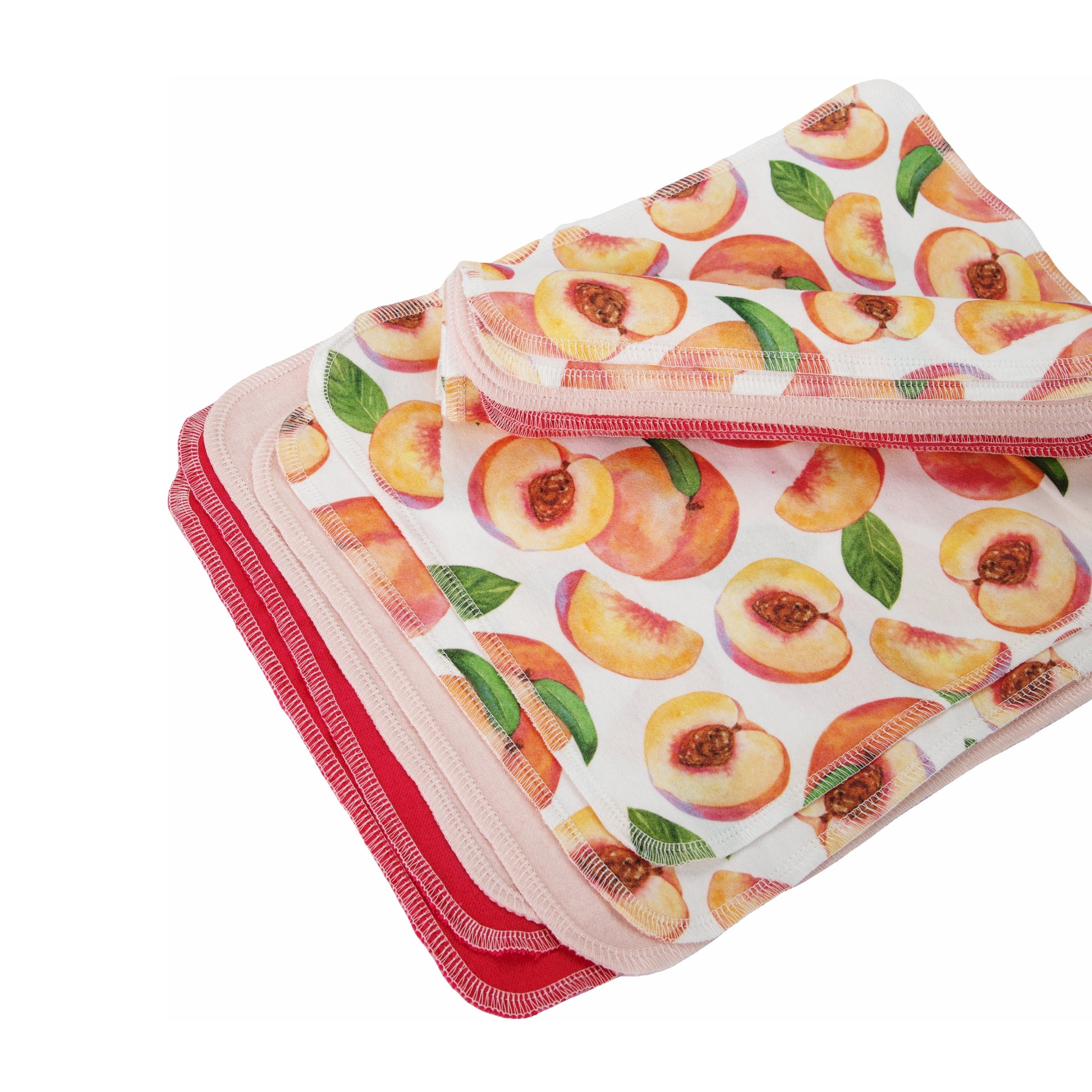 Soft peach fruit pattern flannel napkins stacked view pastel colors